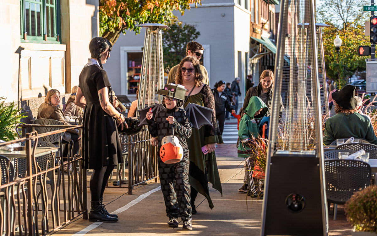 Kids, families, couples trickortreat in downtown Lawrence The