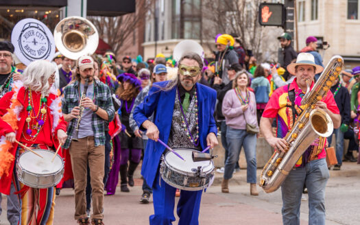 Lawrence Mardi Gras parade draws energetic crowd
