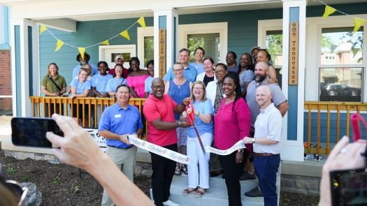 Lawrence community members celebrate opening of Promise Heights housing for families