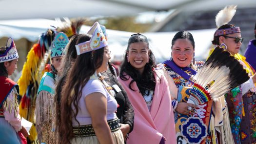  First Grand Entry at Haskell arch and stadium centennial powwow