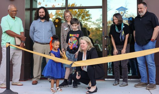 Lawrence school district celebrates opening of Family Engagement Center with ribbon cutting